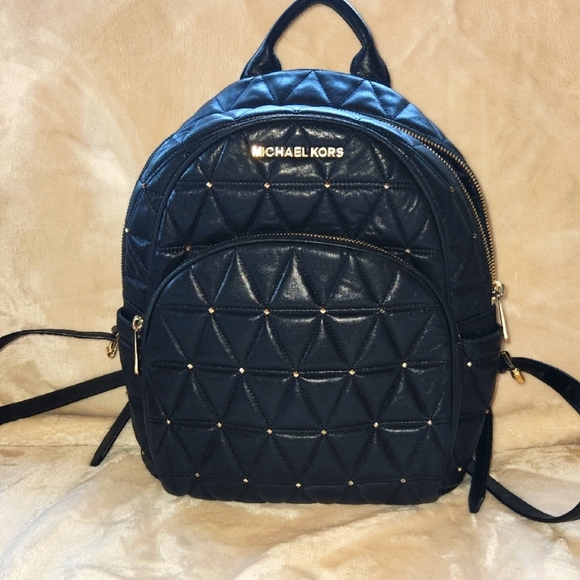 Michael Kors Black Quilted Backpack with Metallic Accents - Picture 1 of 8